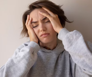 Woman practicing self-compassion and self-esteem counseling exercises