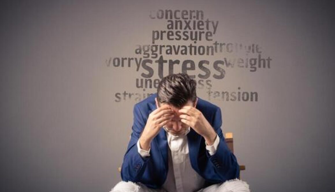 person practicing stress management techniques at work